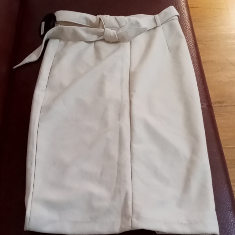 Women knee length tan skirt
